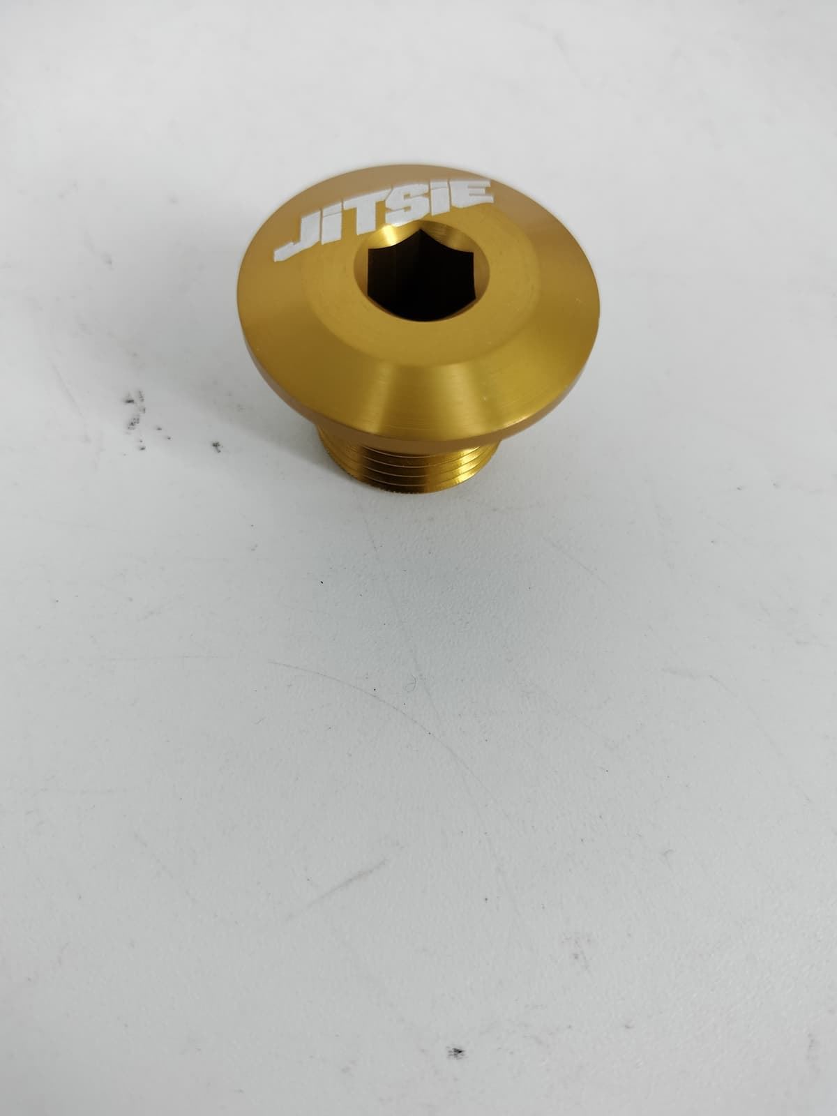 Tuerca eje rueda delantera Jitsie dorada para Gasgas trial - Imagen 1